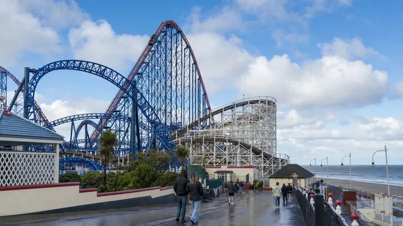 Roller coasters beside the sea at Blackpool Pleasure Beach